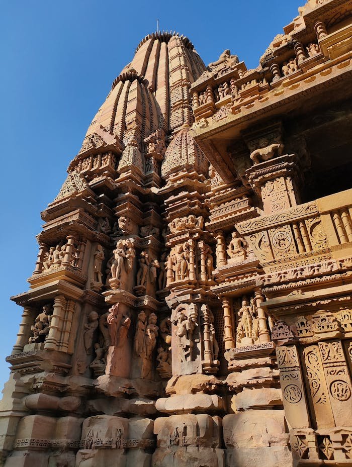 Explore the intricate carvings of ancient Khajuraho Temple in India.